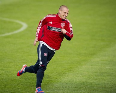 Denmark's Niki Zimling attends a training session with Denmark's Euro 2012 soccer team in Kolobrzeg June 6, 2012. REUTERS/Claus Bech/Scanpix Denmark's Niki Zimling attends a training session with Denmark's Euro 2012 soccer team in Kolobrzeg June 6, 2012. REUTERS/Claus Bech/Scanpix