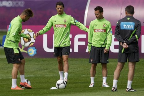Portugal's Cristiano Ronaldo (2nd L) attends a training session for the Euro 2012 soccer tournament at a training field in Opalenica June 11 Portugal's Cristiano Ronaldo (2nd L) attends a training session for the Euro 2012 soccer tournament at a training field in Opalenica June 11