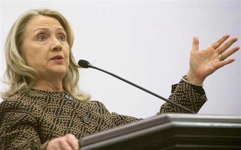 U.S. Secretary of State Hillary Clinton gestures during a joint news conference with the Turkish Foreign Minister Ahmet Davutoglu (unseen) d U.S. Secretary of State Hillary Clinton gestures during a joint news conference with the Turkish Foreign Minister Ahmet Davutoglu (unseen) d