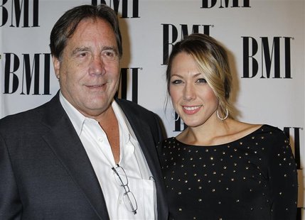 Singer and songwriter Colbie Caillat arrives with her father Ken Caillat at the 59th Annual BMI Pop Awards in Beverly Hills, California May Singer and songwriter Colbie Caillat arrives with her father Ken Caillat at the 59th Annual BMI Pop Awards in Beverly Hills, California May