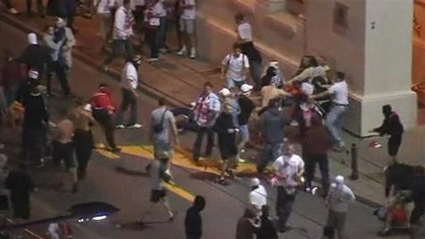 Fans fight in this still image from a video footage following the Euro 2012 soccer match between Poland and Russia in Warsaw June 12, 2012. Fans fight in this still image from a video footage following the Euro 2012 soccer match between Poland and Russia in Warsaw June 12, 2012.