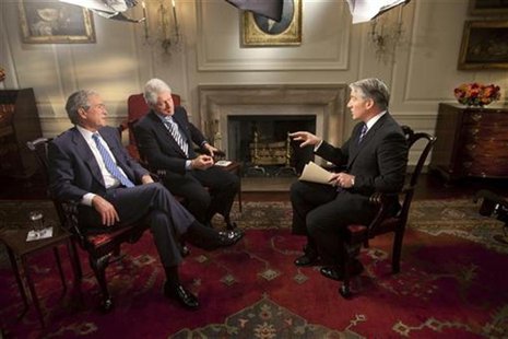 Former U.S. Presidents Bill Clinton (C) and George W. Bush (2nd L) are interviewed by CNN's John King in the Map Room of the White House, in Former U.S. Presidents Bill Clinton (C) and George W. Bush (2nd L) are interviewed by CNN's John King in the Map Room of the White House, in