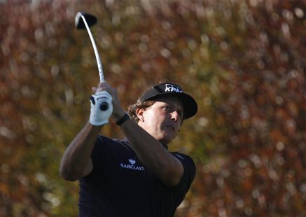 Phil Mickelson of the U.S. tees off on the first hole during a practice round for the 2012 U.S. Open golf tournament on the Lake Course at t Phil Mickelson of the U.S. tees off on the first hole during a practice round for the 2012 U.S. Open golf tournament on the Lake Course at t