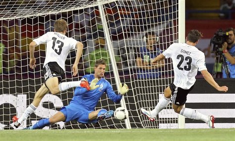 REFILE - CORRECTING BYLINE Germany's Mario Gomez (R) scores a goal against Netherlands during their Group B Euro 2012 soccer match at the Me REFILE - CORRECTING BYLINE Germany's Mario Gomez (R) scores a goal against Netherlands during their Group B Euro 2012 soccer match at the Me