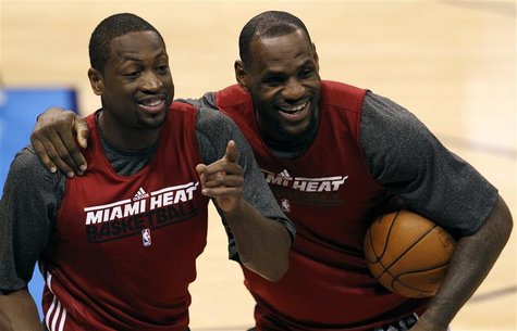 Miami Heat's LeBron James (R) and Dwyane Wade share a laugh during a team practice for the NBA basketball finals in Oklahoma City, Oklahoma, Miami Heat's LeBron James (R) and Dwyane Wade share a laugh during a team practice for the NBA basketball finals in Oklahoma City, Oklahoma,