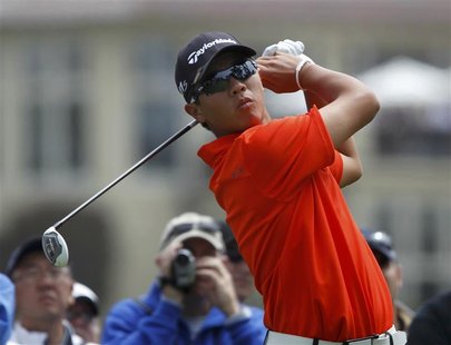China's Andy Zhang tees off on the fourth hole during a practice round for the 2012 U.S. Open golf tournament on the Lake Course at the Olym China's Andy Zhang tees off on the fourth hole during a practice round for the 2012 U.S. Open golf tournament on the Lake Course at the Olym