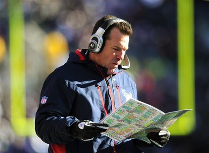 Houston Texans head coach Gary Kubiak looks over his play chart as his team plays the Baltimore Ravens in their NFL AFC Divisional Playoff f Houston Texans head coach Gary Kubiak looks over his play chart as his team plays the Baltimore Ravens in their NFL AFC Divisional Playoff f