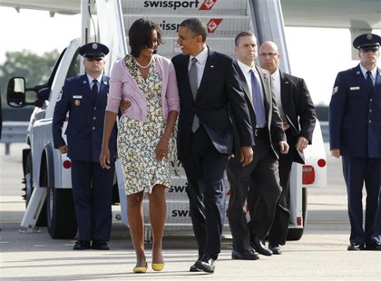 U.S. President Barack Obama and first lady Michelle Obama arrive in New York June 14, 2012. REUTERS/Kevin Lamarque U.S. President Barack Obama and first lady Michelle Obama arrive in New York June 14, 2012. REUTERS/Kevin Lamarque