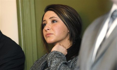 Bristol Palin watches while her mother former Alaska governor Sarah Palin delivers her keynote speech at the Reagan 100 opening banquet at t Bristol Palin watches while her mother former Alaska governor Sarah Palin delivers her keynote speech at the Reagan 100 opening banquet at t