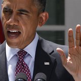 U.S. President Barack Obama responds to a reporter's questions as he speaks about immigration from the Rose Garden of the White House in Was