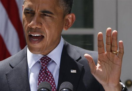 U.S. President Barack Obama responds to a reporter's questions as he speaks about immigration from the Rose Garden of the White House in Was U.S. President Barack Obama responds to a reporter's questions as he speaks about immigration from the Rose Garden of the White House in Was