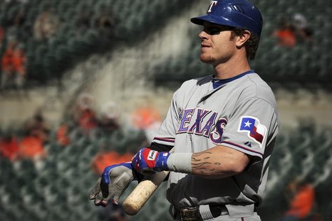 Texas Rangers batter Josh Hamilton stands on deck before batting against the Baltimore Orioles in their first game of a doubleheader during Texas Rangers batter Josh Hamilton stands on deck before batting against the Baltimore Orioles in their first game of a doubleheader during