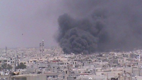 Smoke rises from Homs June 13, 2012. Escalating violence in Syria forced United Nations observers to suspend operations on Saturday, in the Smoke rises from Homs June 13, 2012. Escalating violence in Syria forced United Nations observers to suspend operations on Saturday, in the