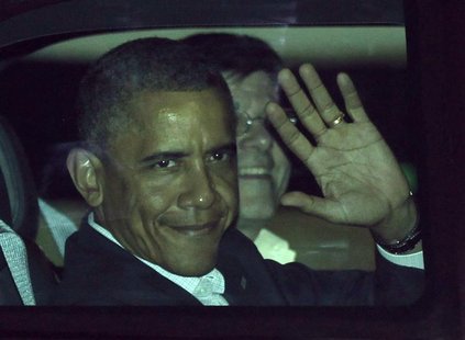 U.S. President Barack Obama waves from his car after landing at the airport in Los Cabos June 17, 2012. REUTERS/Henry Romero U.S. President Barack Obama waves from his car after landing at the airport in Los Cabos June 17, 2012. REUTERS/Henry Romero