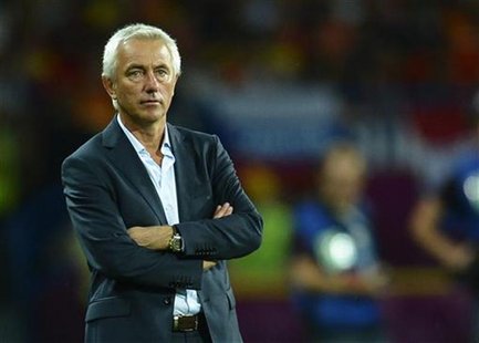 Netherlands' coach Bert van Marwijk watches during their Group B Euro 2012 soccer match against Portugal at the Metalist stadium in Kharkiv, Netherlands' coach Bert van Marwijk watches during their Group B Euro 2012 soccer match against Portugal at the Metalist stadium in Kharkiv,