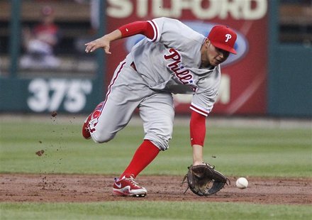 Philadelphia Phillies second baseman Freddy Galvis fields a ball hit by St. Louis Cardinals starting pitcher Kyle Lohse during the second in Philadelphia Phillies second baseman Freddy Galvis fields a ball hit by St. Louis Cardinals starting pitcher Kyle Lohse during the second in
