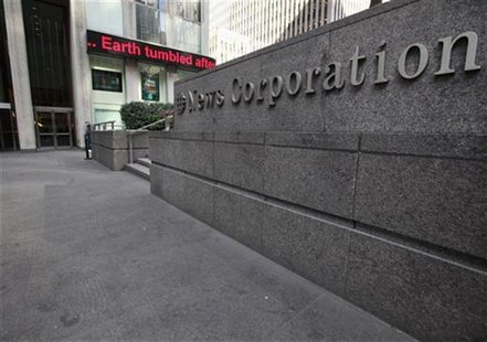 A sign is seen in front of the the NewsCorp building in New York February 8, 2012. REUTERS/Brendan McDermid A sign is seen in front of the the NewsCorp building in New York February 8, 2012. REUTERS/Brendan McDermid