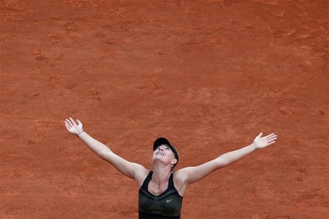 Maria Sharapova of Russia reacts after winning her women's singles final match against Sara Errani of Italy at the French Open tennis tourna Maria Sharapova of Russia reacts after winning her women's singles final match against Sara Errani of Italy at the French Open tennis tourna