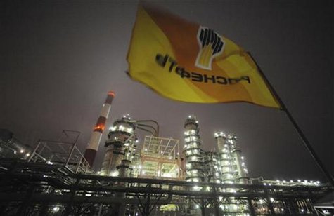 Flag with the logo of Rosneft, Russia's largest oil company, flutters over the Novokuibyshevsk refinery near the city of Samara, October 28, Flag with the logo of Rosneft, Russia's largest oil company, flutters over the Novokuibyshevsk refinery near the city of Samara, October 28,