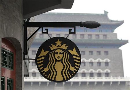The Starbucks logo is seen outside its coffee store in front of Zhengyangmen Gate at Qianmen Commercial Street in central Beijing, April 19, The Starbucks logo is seen outside its coffee store in front of Zhengyangmen Gate at Qianmen Commercial Street in central Beijing, April 19,