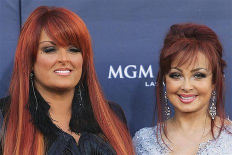 The Judds, Wynonna Judd (L) and Naomi Judd arrive at the 46th annual Academy of Country Music Awards in Las Vegas April 3, 2011. REUTERS/Sam The Judds, Wynonna Judd (L) and Naomi Judd arrive at the 46th annual Academy of Country Music Awards in Las Vegas April 3, 2011. REUTERS/Sam