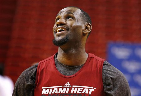 Miami Heat player LeBron James smiles during a team practice at the NBA basketball finals in Miami June 20, 2012. REUTERS/Mike Segar Miami Heat player LeBron James smiles during a team practice at the NBA basketball finals in Miami June 20, 2012. REUTERS/Mike Segar