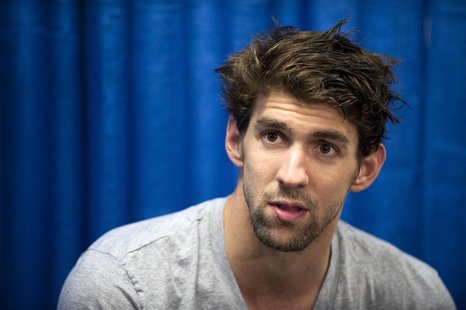 Michael Phelps talks to the media during a news conference at the USA Swimming Grand Prix Charlotte Ultra Swim at the Mecklenburg County Aqu Michael Phelps talks to the media during a news conference at the USA Swimming Grand Prix Charlotte Ultra Swim at the Mecklenburg County Aqu