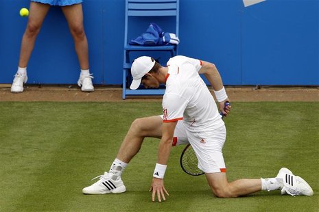 Andy Murray of Britain reacts during his men's singles tennis match agianst Nicolas Mahut of France at the Queen's Club tournament in London Andy Murray of Britain reacts during his men's singles tennis match agianst Nicolas Mahut of France at the Queen's Club tournament in London