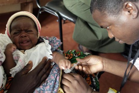 A child is given an injection as part of a malaria vaccine trial at a clinic in the Kenya coastal town of Kilifi, November 23, 2010. Malaria A child is given an injection as part of a malaria vaccine trial at a clinic in the Kenya coastal town of Kilifi, November 23, 2010. Malaria