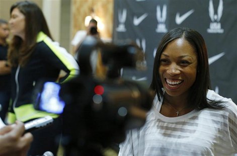 Sprinter Allyson Felix answers a reporter's question following a news conference at the U.S. Olympic athletics trials in Eugene, Oregon June Sprinter Allyson Felix answers a reporter's question following a news conference at the U.S. Olympic athletics trials in Eugene, Oregon June