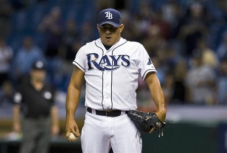 Tampa Bay Rays reliever Joel Peralta takes a deep breath before striking out Seattle Mariners' Chone Figgins to end the game and save a 5-4 Tampa Bay Rays reliever Joel Peralta takes a deep breath before striking out Seattle Mariners' Chone Figgins to end the game and save a 5-4