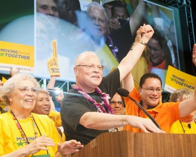 Lee Saunders (C) celebrates his victory on June 22, 2012, as the first African-American to be elected President of the American Federation of State, County and Municipal Employees at the union's 40th International Convention in Los Angeles, California. (photo courtesy AFSCME) Lee Saunders (C) celebrates his victory on June 22, 2012, as the first African-American to be elected President of the American Federation of State, County and Municipal Employees at the union's 40th International Convention in Los Angeles, California. (photo courtesy AFSCME)
