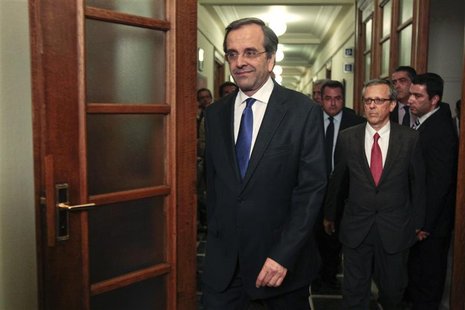 Newly appointed Greek Prime Minister Antonis Samaras arrives for the first cabinet meeting of his government at the parliament in Athens Jun Newly appointed Greek Prime Minister Antonis Samaras arrives for the first cabinet meeting of his government at the parliament in Athens Jun
