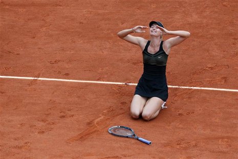 Maria Sharapova of Russia reacts after winning her women's singles final match against Sara Errani of Italy at the French Open tennis tourna Maria Sharapova of Russia reacts after winning her women's singles final match against Sara Errani of Italy at the French Open tennis tourna
