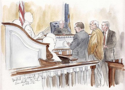 Former Penn State assistant football coach Jerry Sandusky (2nd R) stands with his lawyers as the jury foreman reads the verdict in this cour Former Penn State assistant football coach Jerry Sandusky (2nd R) stands with his lawyers as the jury foreman reads the verdict in this cour