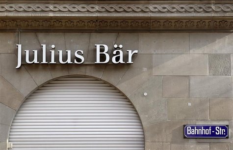 The logo of Swiss bank Julius Baer is pictured at the company's headquarters at the Bahnhofstrasse in Zurich February 6, 2012. REUTERS/Arnd The logo of Swiss bank Julius Baer is pictured at the company's headquarters at the Bahnhofstrasse in Zurich February 6, 2012. REUTERS/Arnd