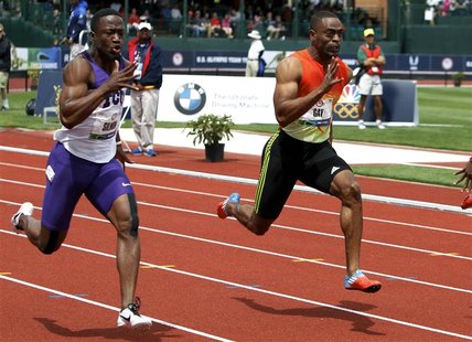 Tyson Gay (R) and Charles Silmon (L) compete in the men's 100 metre semi-final at the U.S. Olympic athletics trials in Eugene, Oregon June 2 Tyson Gay (R) and Charles Silmon (L) compete in the men's 100 metre semi-final at the U.S. Olympic athletics trials in Eugene, Oregon June 2