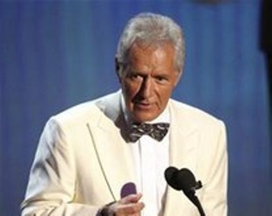 Television host Alex Trebek accepts the Lifetime Achievement Award during the 38th Annual Daytime Entertainment Emmy Awards at the Las Vegas Television host Alex Trebek accepts the Lifetime Achievement Award during the 38th Annual Daytime Entertainment Emmy Awards at the Las Vegas