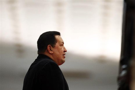 Venezuela's President Hugo Chavez waits to receive his Iranian counterpart Mahmoud Ahmadinejad at Miraflores Palace in Caracas June 22, 2012 Venezuela's President Hugo Chavez waits to receive his Iranian counterpart Mahmoud Ahmadinejad at Miraflores Palace in Caracas June 22, 2012