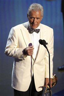Television host Alex Trebek accepts the Lifetime Achievement Award during the 38th Annual Daytime Entertainment Emmy Awards at the Las Vegas Television host Alex Trebek accepts the Lifetime Achievement Award during the 38th Annual Daytime Entertainment Emmy Awards at the Las Vegas