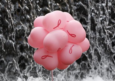 Pink balloons are displayed in front of an artificial waterfall during the "Pink Ribbon" breast cancer awareness campaign at Cheonggye Strea Pink balloons are displayed in front of an artificial waterfall during the "Pink Ribbon" breast cancer awareness campaign at Cheonggye Strea