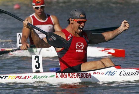 Adam Van Koeverden (front) of Canada celebrates winning the men's K1 1000m final during the ICF Canoe and Kayak Sprint World Championships i Adam Van Koeverden (front) of Canada celebrates winning the men's K1 1000m final during the ICF Canoe and Kayak Sprint World Championships i