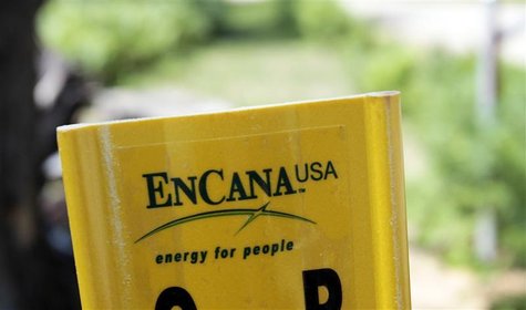 A yellow Encana natural gas pipeline marker is seen along a road on state forest park land in Kalkaska, Michigan June 20, 2012. To match Spe A yellow Encana natural gas pipeline marker is seen along a road on state forest park land in Kalkaska, Michigan June 20, 2012. To match Spe