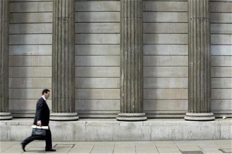 A man walks through the financial district in the City of London June 22, 2012. REUTERS/Neil Hall A man walks through the financial district in the City of London June 22, 2012. REUTERS/Neil Hall