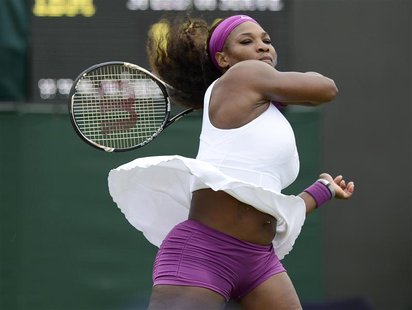 Serena Williams of the U.S. hits a return to Barbora Zahlavova Strycova of the Czech Republic during their women's singles tennis match at t Serena Williams of the U.S. hits a return to Barbora Zahlavova Strycova of the Czech Republic during their women's singles tennis match at t
