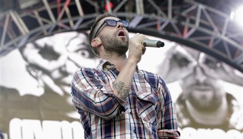 Singer Adam Levine of Maroon 5 performs with Gym Class Heroes at the 2012 Wango Tango concert at the Home Depot Center in Carson, California Singer Adam Levine of Maroon 5 performs with Gym Class Heroes at the 2012 Wango Tango concert at the Home Depot Center in Carson, California