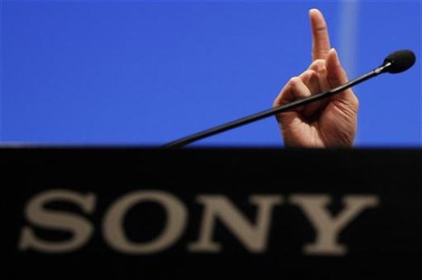 The right hand of Sony Corp's new President and Chief Executive Officer Kazuo Hirai is seen above the company's logo during a news conferenc The right hand of Sony Corp's new President and Chief Executive Officer Kazuo Hirai is seen above the company's logo during a news conferenc