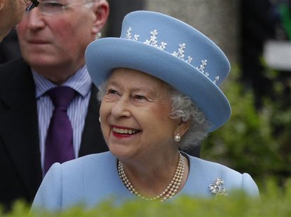 Britain's Queen Elizabeth smiles after she attended a Service of Thanksgiving at Saint Macartin's Cathedral in Ennniskillen, Northern Irelan Britain's Queen Elizabeth smiles after she attended a Service of Thanksgiving at Saint Macartin's Cathedral in Ennniskillen, Northern Irelan