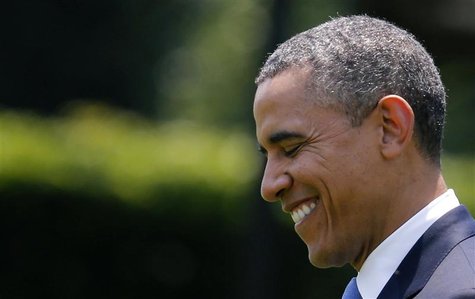 U.S. President Barack Obama smiles while walking towards Marine One on the South Lawn of the White House in Washington June 28, 2012. REUTER U.S. President Barack Obama smiles while walking towards Marine One on the South Lawn of the White House in Washington June 28, 2012. REUTER
