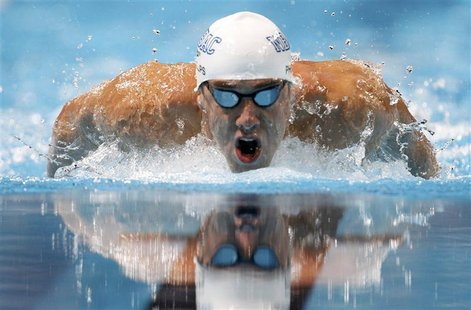 Micahel Phelps swims the men's 200m butterfly final during the U.S. Olympic swimming trials in Omaha, Nebraska, June 28, 2012. REUTERS/Jeff Micahel Phelps swims the men's 200m butterfly final during the U.S. Olympic swimming trials in Omaha, Nebraska, June 28, 2012. REUTERS/Jeff